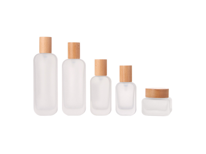 New cosmetic packaging empty glass bottles with solid wood lids