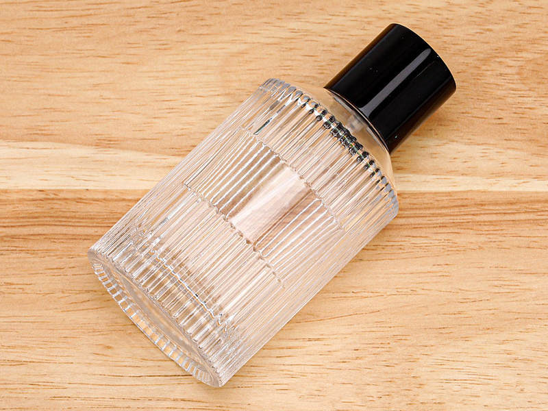 Round vertical pattern glass perfume spray bottle