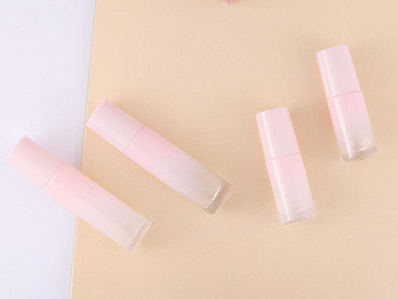 Gradient pink glass essential oil roller bottles