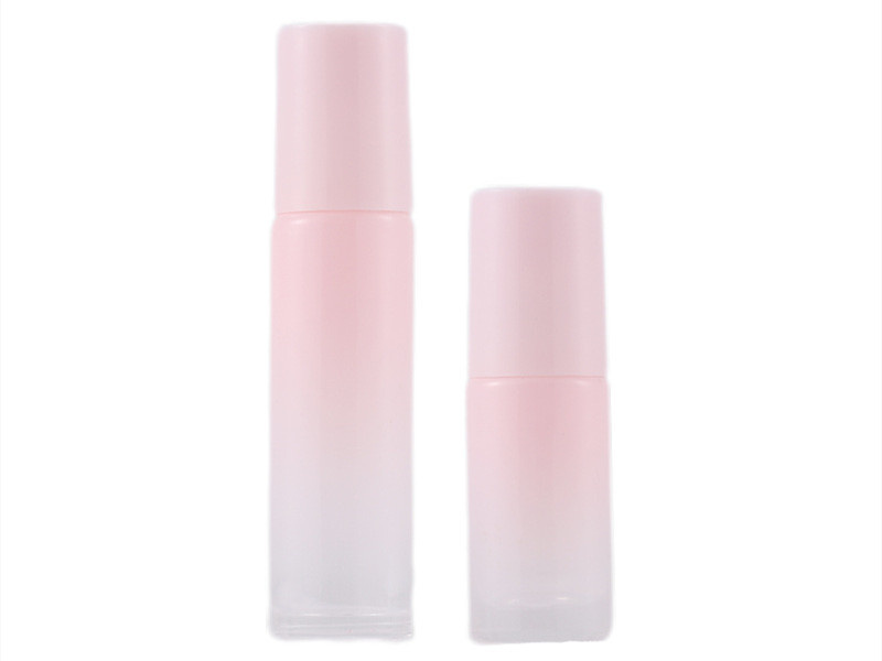 Gradient pink glass essential oil roller bottles