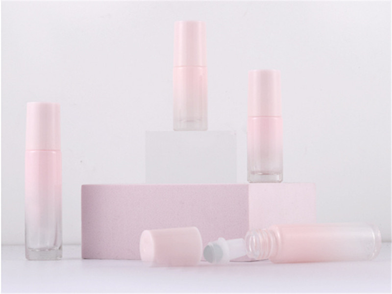 Gradient pink glass essential oil roller bottles