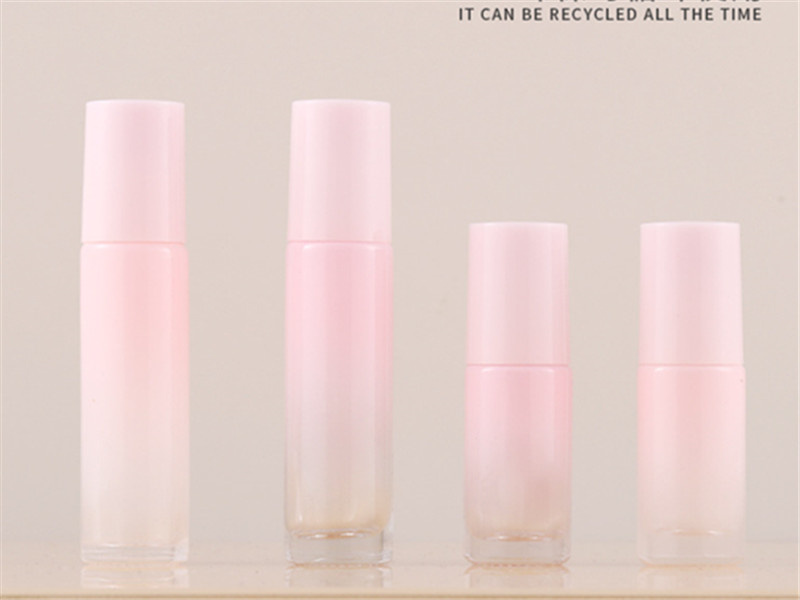 Gradient pink glass essential oil roller bottles