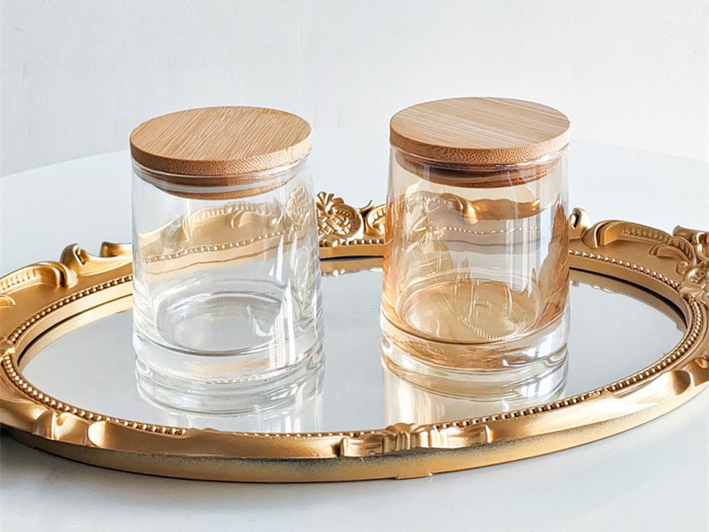 Amber colored candle jars with wooden lid