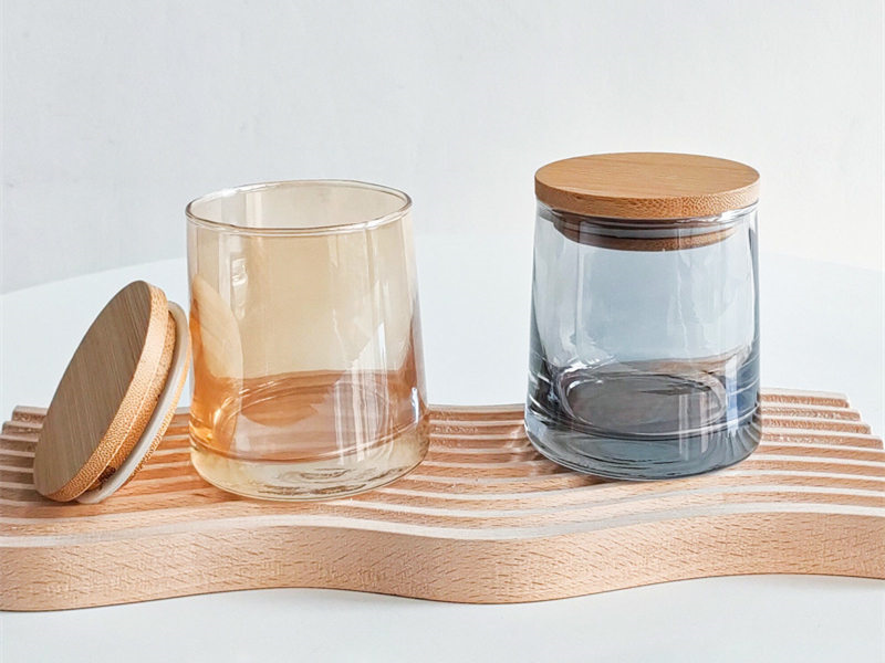 Amber colored candle jars with wooden lid