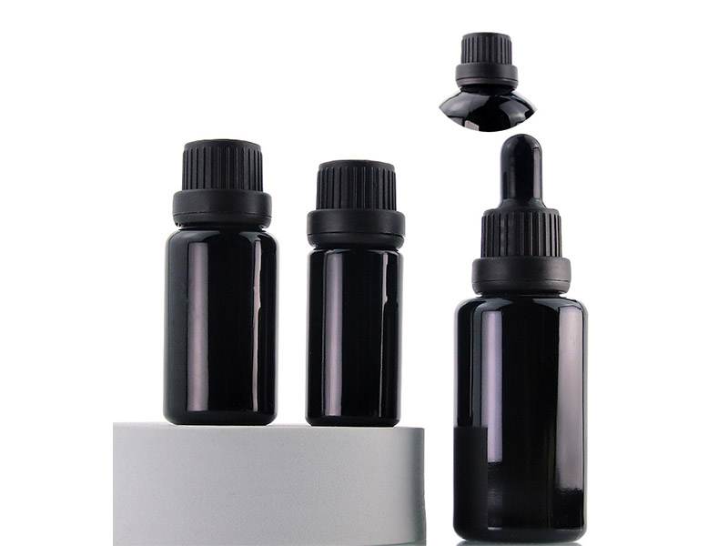 Shiny black essential oil bottle with anti-theft cover dropper bottle