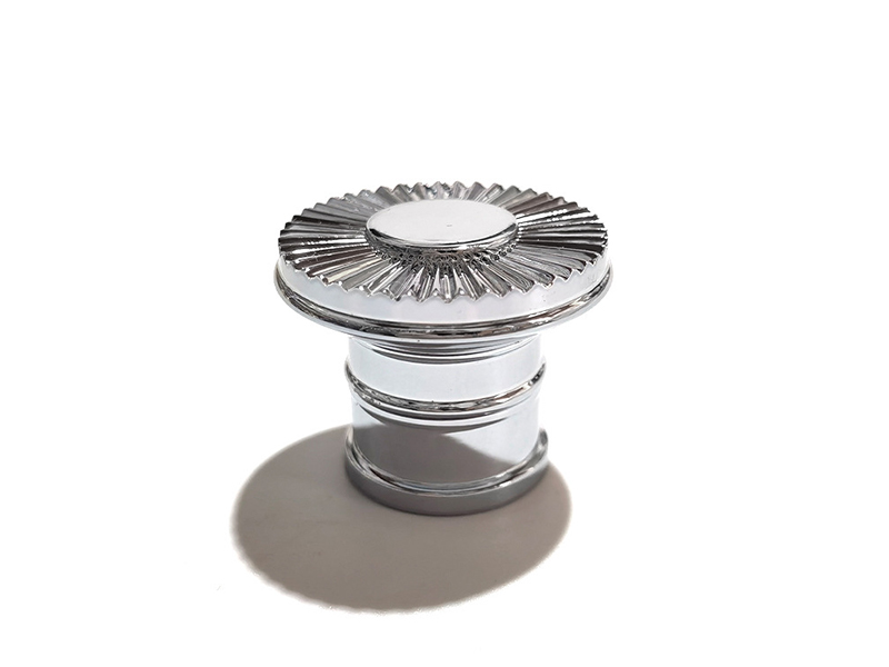 Silver perfume bottle cap