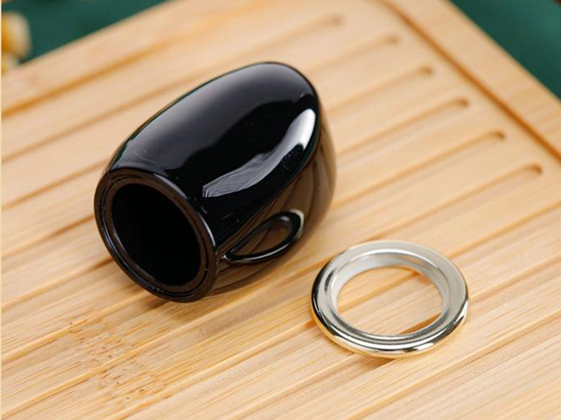 Black plastic perfume bottle cap