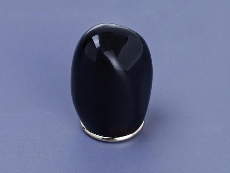 Black plastic perfume bottle cap