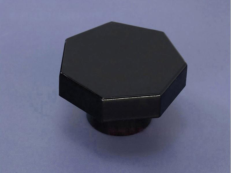 Black plastic perfume bottle cap