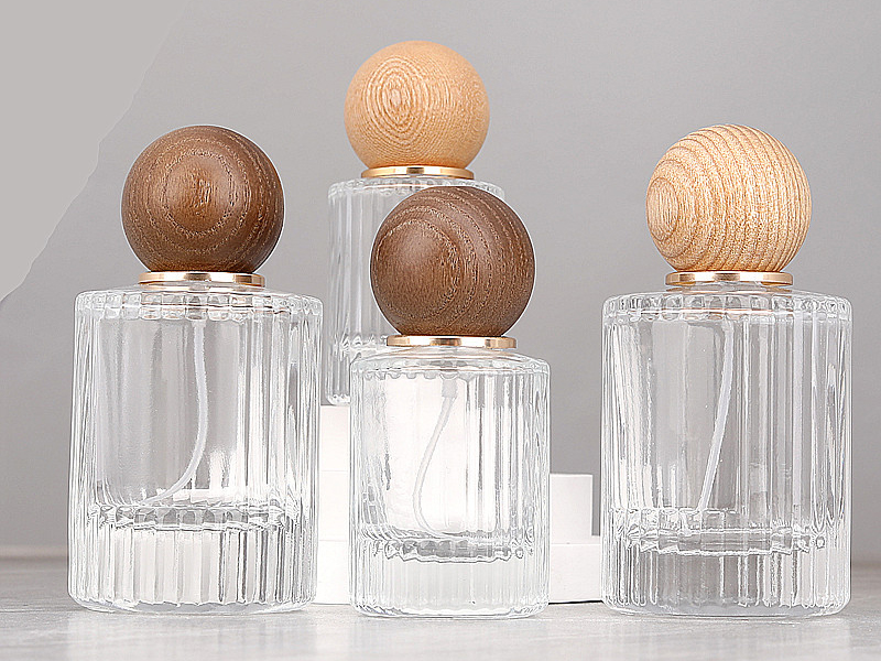 Spherical cap stripe empty glass perfume bottle