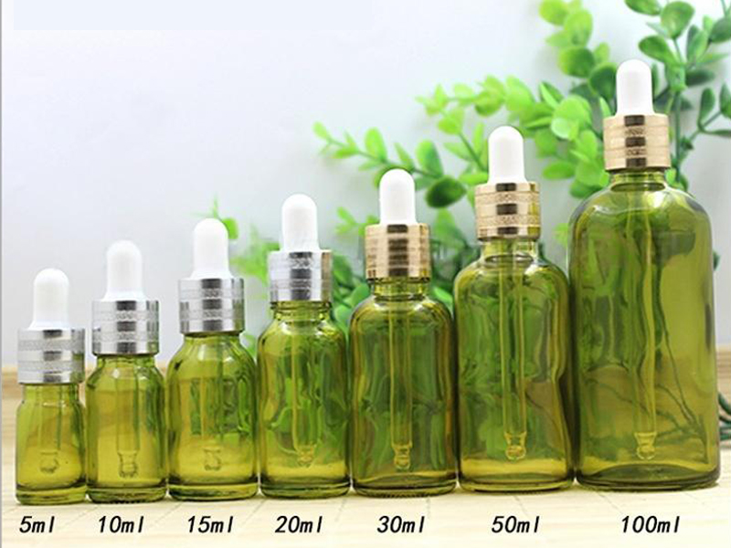 Olive green essential oil bottle